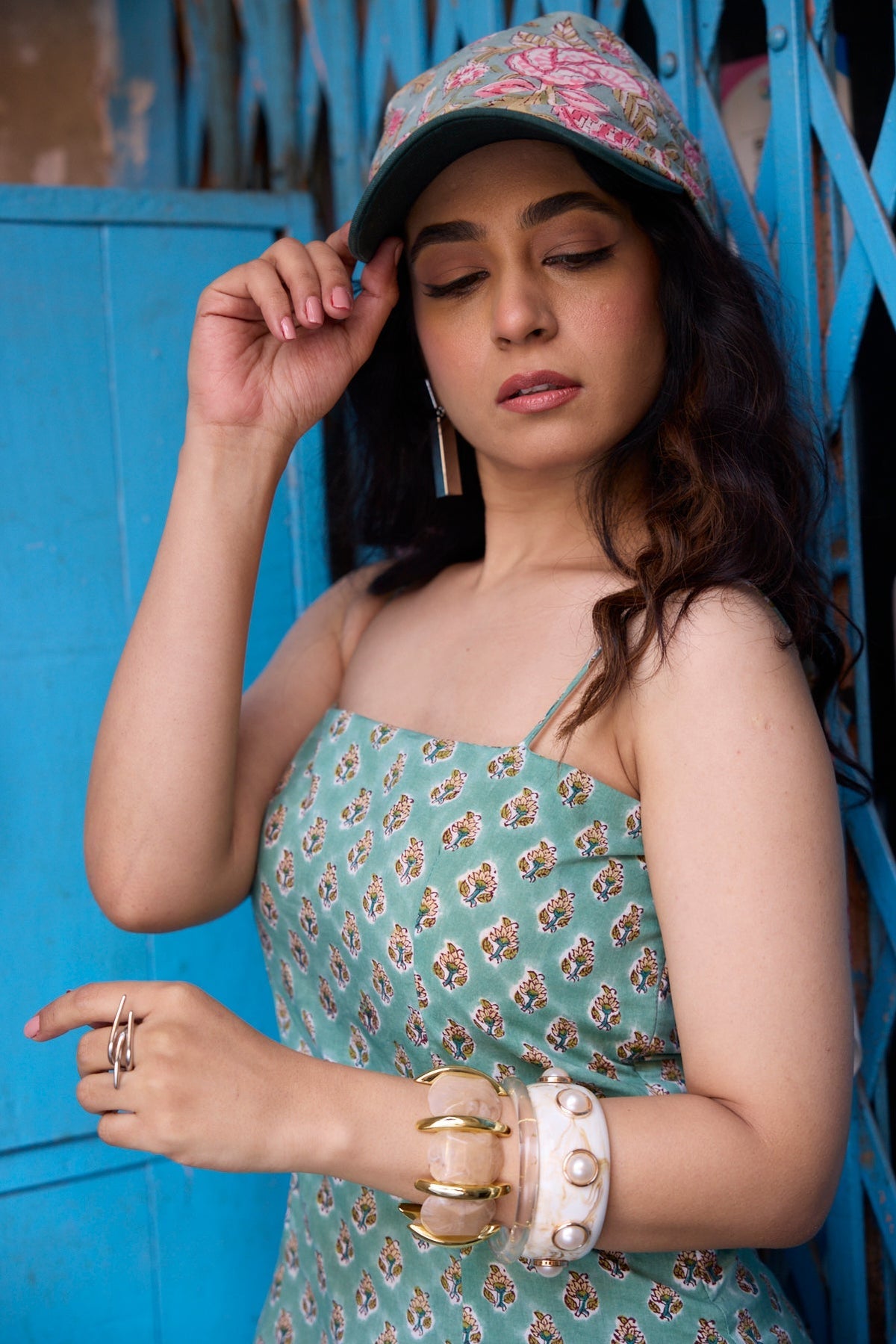 “Women wearing green hand block print cotton short kurti with jeans casual look”